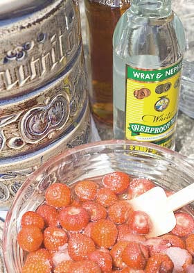 strawberries are the first layer of fruit to go into the rumtopf jar