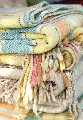 piles of blankets - it's time to wash them